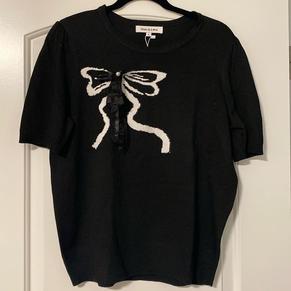 New black shirt with bow